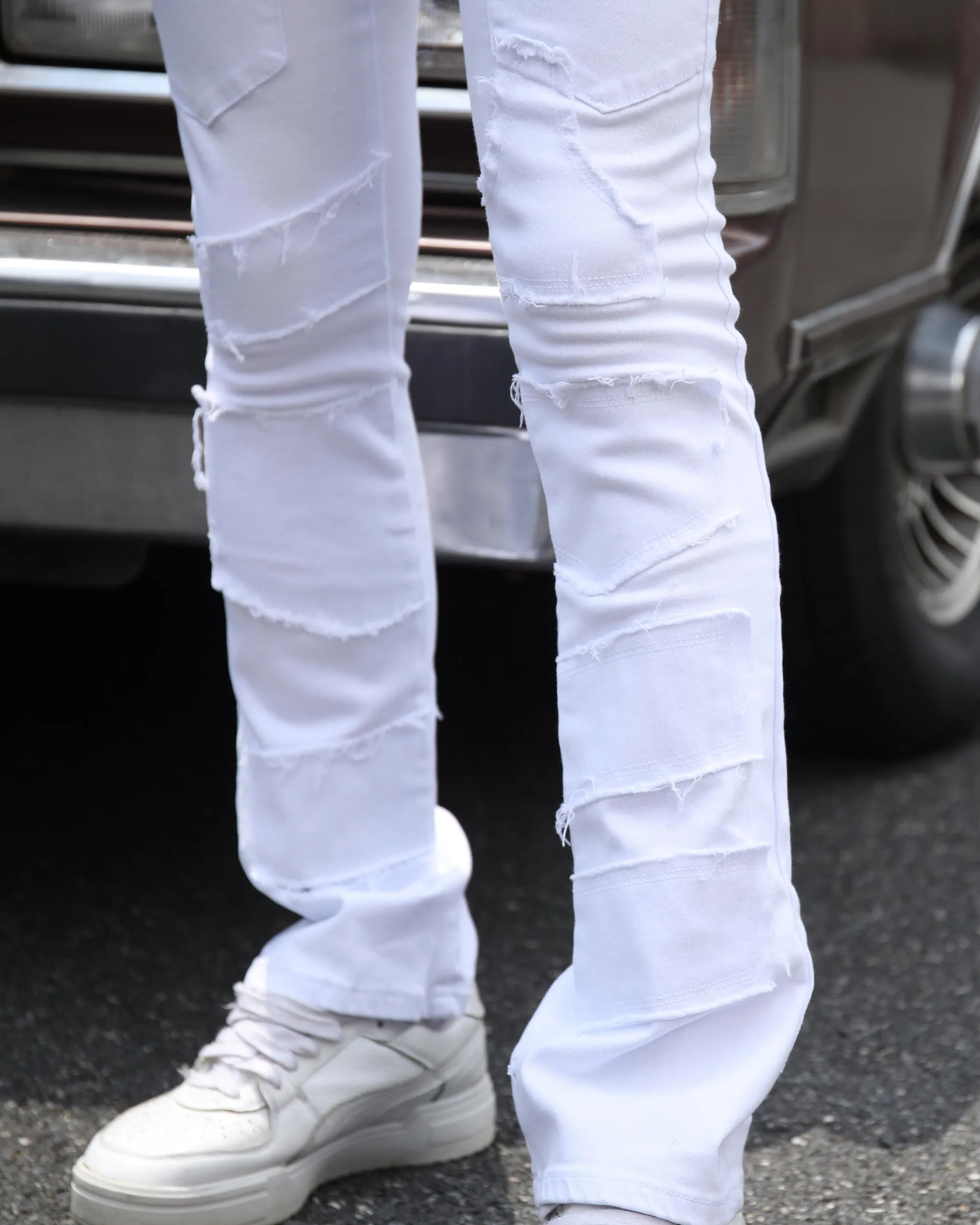 Vintage White Flared Jeans with Raw-Edged Accents
