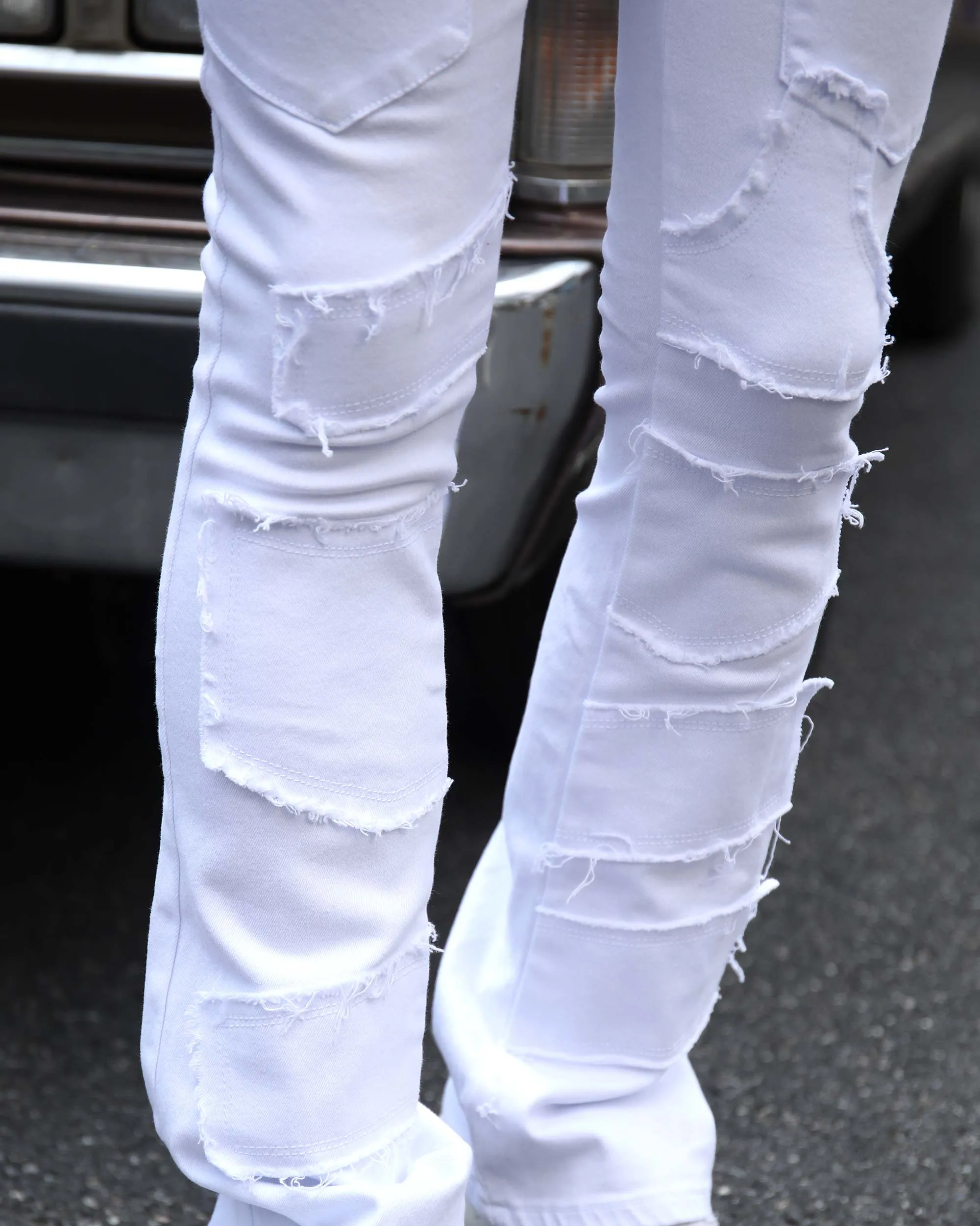 Vintage White Flared Jeans with Raw-Edged Accents