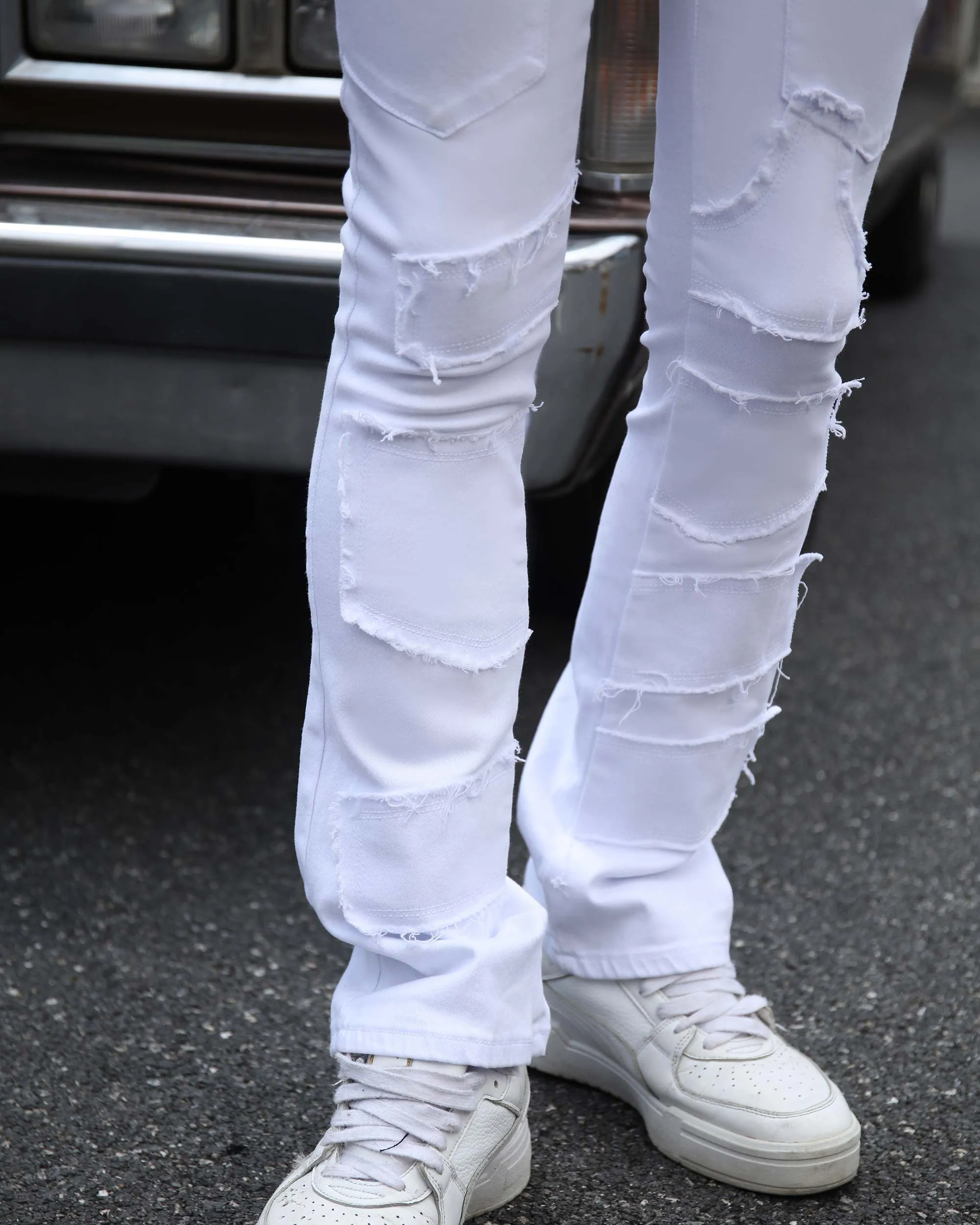 Vintage White Flared Jeans with Raw-Edged Accents